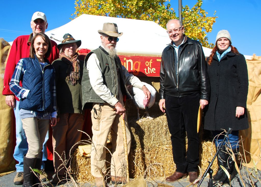 LTR Ed Harlan Assistant Agriculture Commissioner, Ashlea Hogancamp owner of Herban Market, Sue and Adam Turtle of Earth Advocates Research Farm, Danny the Turkey, Franklin Mayor Ken Moore and Market Executive Director Amy Tavalin